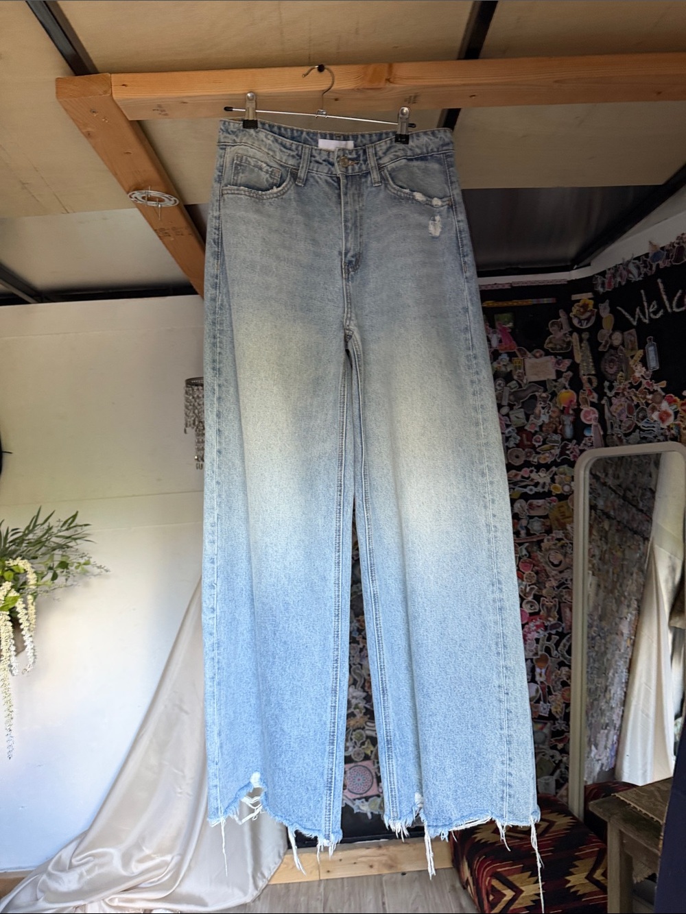 High-Rise Light Blue Wide-Leg Jeans with Frayed Hem